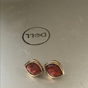 Light burgandy clipping earrings.  Stone centers.  Never worn.